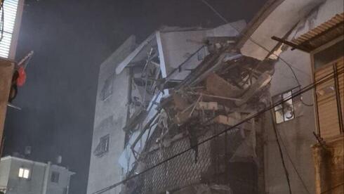 Iranian cluster missile hits central Israel after interception miss; 12 wounded in Bn