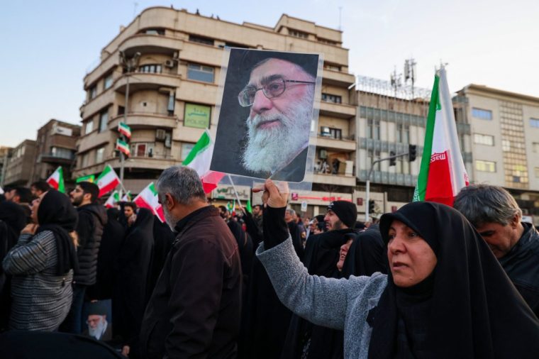 People gather at a square to mourn the death of Iran's Supreme Leader Ayatollah Ali Khamenei, who was killed in joint US and Israeli strikes, in Tehran on March 1, 2026. (Photo: Atta Kenare/AFP via Getty Images)