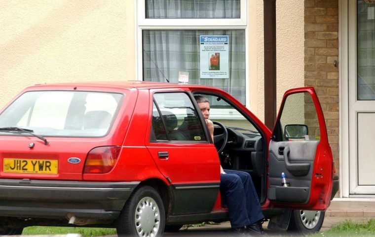File photo dated 08/08/02 of caretaker Ian Huntley sitting in his car outside his house near the college in Soham, Cambs, during the period when police were looking for 10-year-old Holly Wells and Jessica Chapman. Soham killer Ian Huntley has died in hospital after he was attacked in the workshop of the maximum security Frankland prison by an inmate with a metal bar on February 26, the Press Association understands. Issue date: Saturday March 07, 2026. PA Photo. Photo credit should read: Andrew Parsons/PA Wire