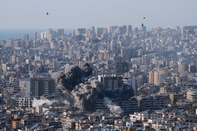 Smoke rise from an Israeli airstrike in Dahiyeh, Beirut's southern suburbs, Lebanon, Tuesday, March 10, 2026. (AP Photo/Bilal Hussein)