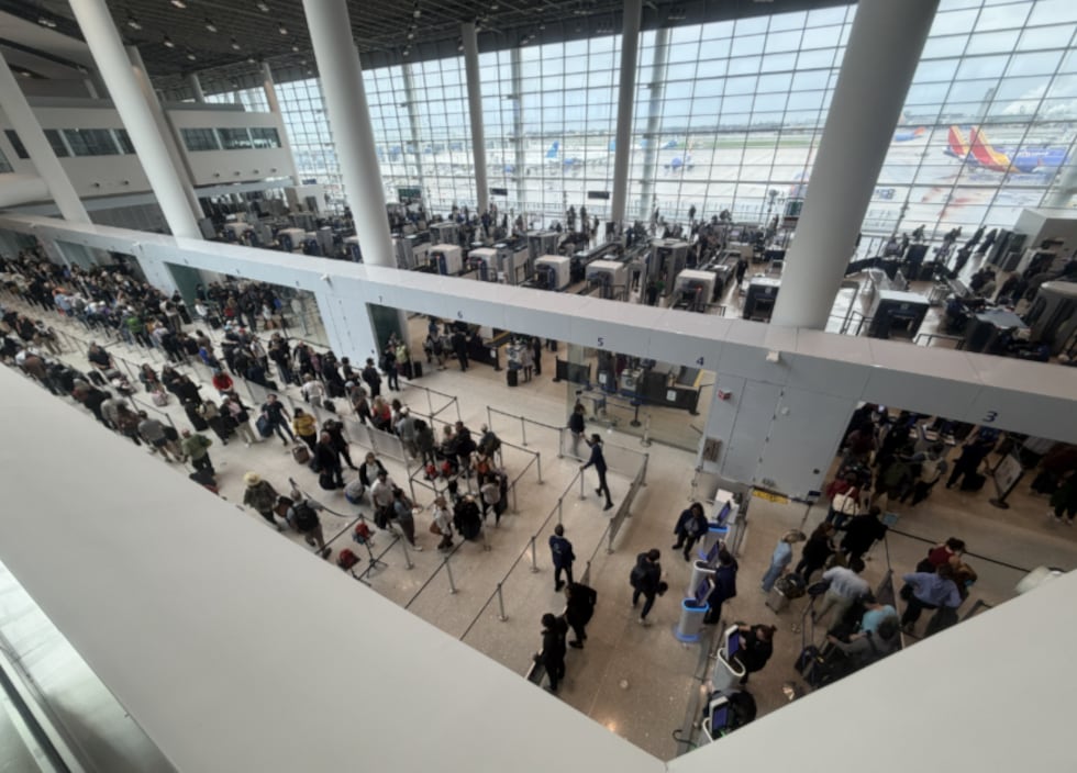 Passengers were advised to arrive at least three hours before their scheduled flights Sunday...