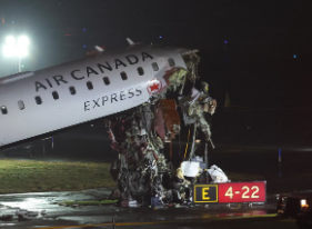 An Air Canada Express CRJ-900 sits on the runway after colliding with a Port Authority fire truck at LaGuardia Airport in New York, on March 23, 2026. Air Canada Express flight AC8646 originated from Montreal and collided with the fire truck during landing
