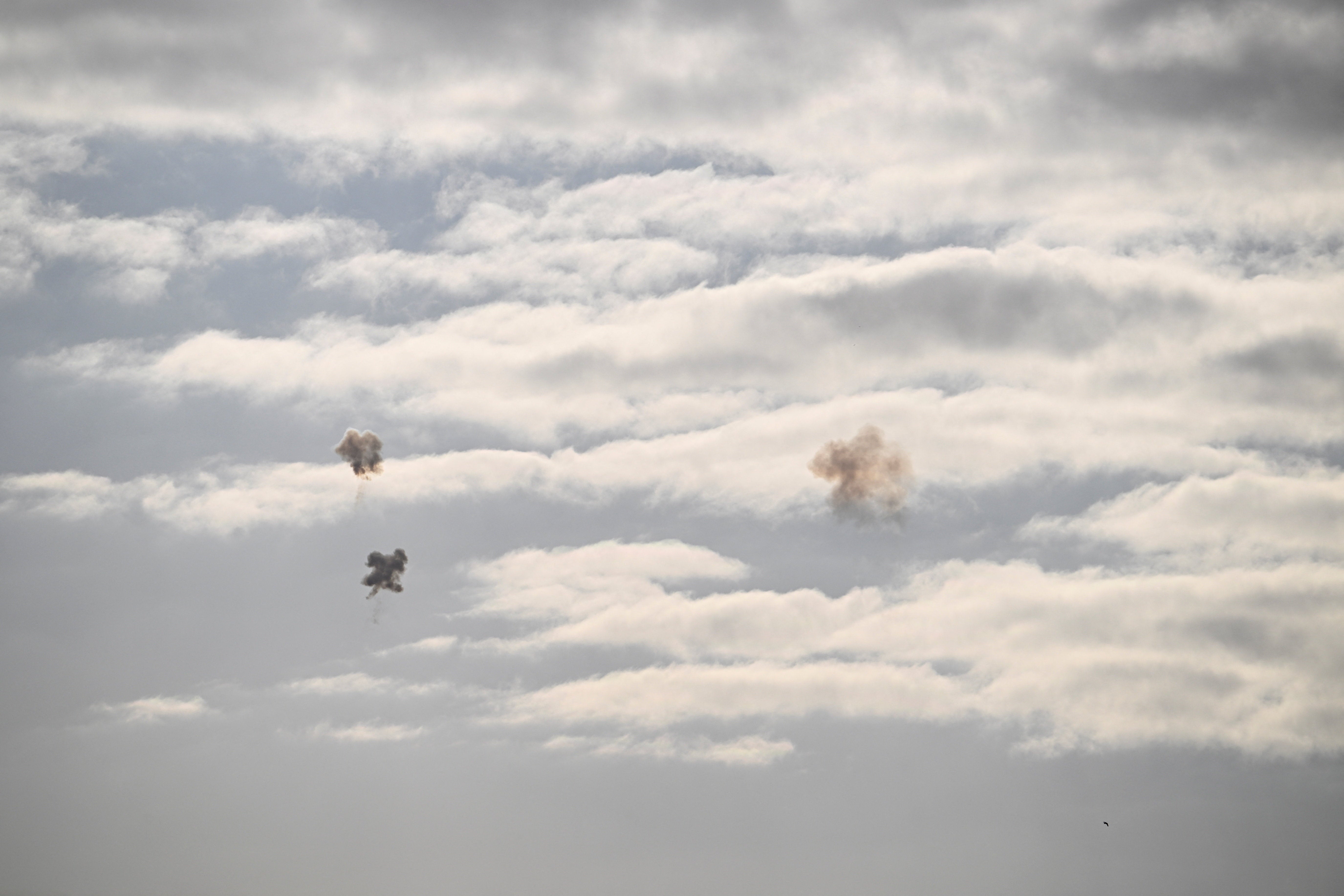 Smoke trails in the sky after Israel intercepted missiles launched from Iran, amid the US-Israeli conflict with Iran, as seen from Tel Aviv