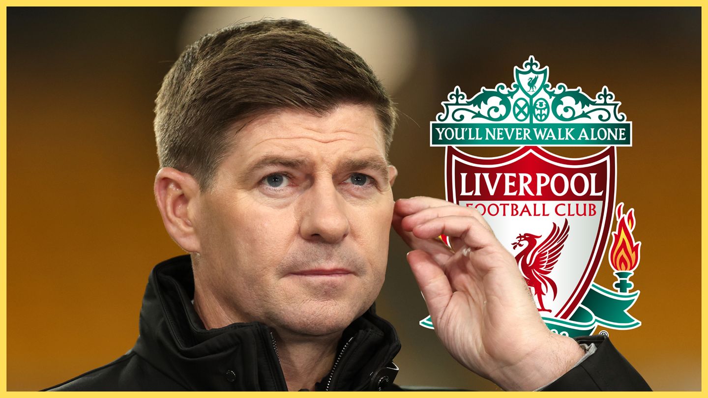 Steven Gerrard puts his hand to his ear next to Liverpool club badge.