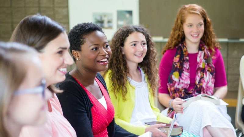 A Young Women class meets together.