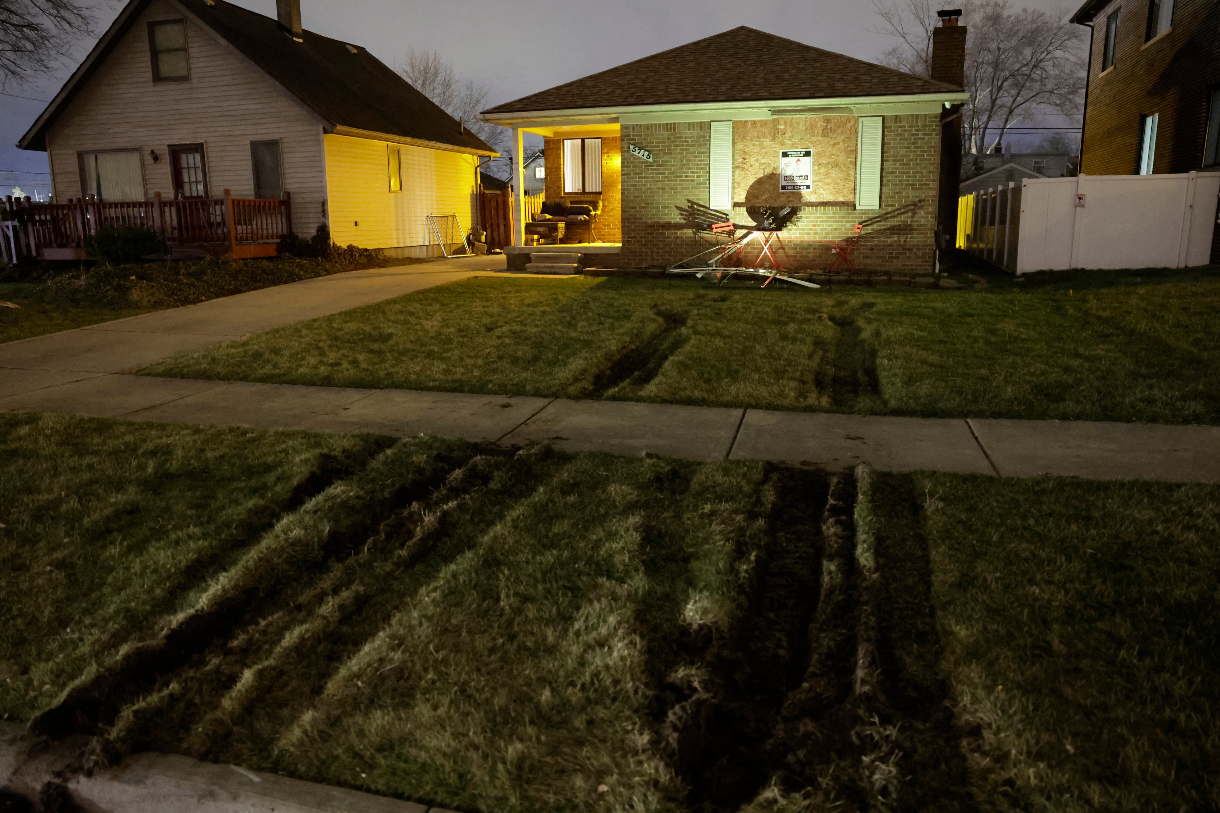 Tire tracks on the lawn where law enforcement breached the Dearborn Heights, Michigan home of Ayman Ghazali