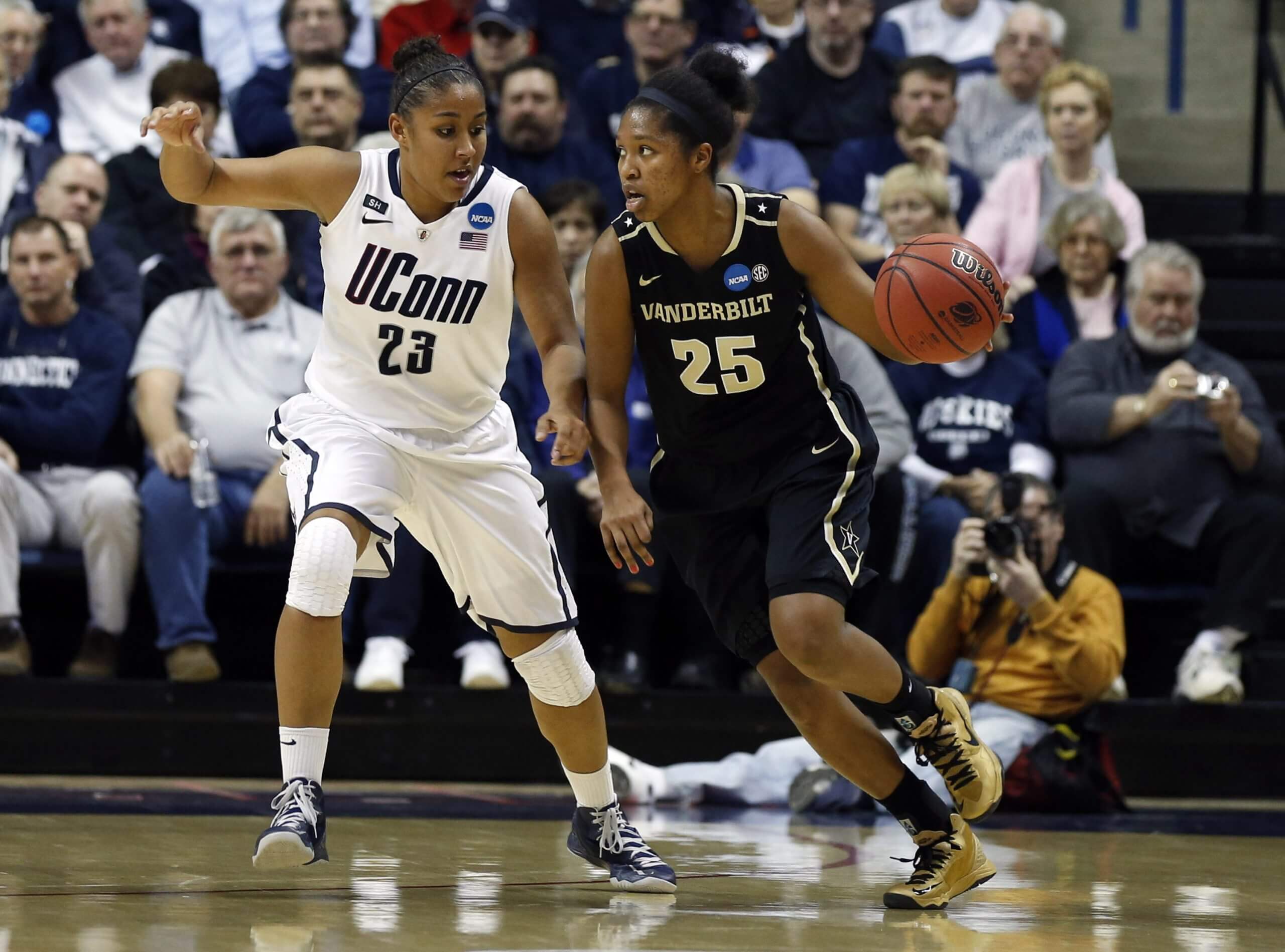 Vanderbilt women's basketball player Morgan Batey dribbles with her left hand during an NCAA Tournament game against the UConn Huskies in 2013.