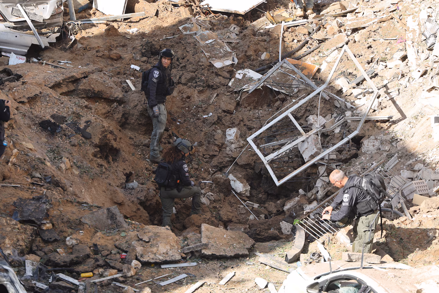 Israel and Iran exchange strikes as Trump says U.S. is negotiating end to war