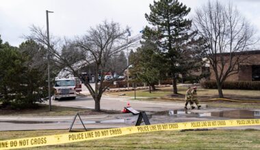 Police officers and firefighters at the scene where a truck was rammed into Temple Israel, a synagogue in West Bloomfield Township, Mich., March 12, 2026.