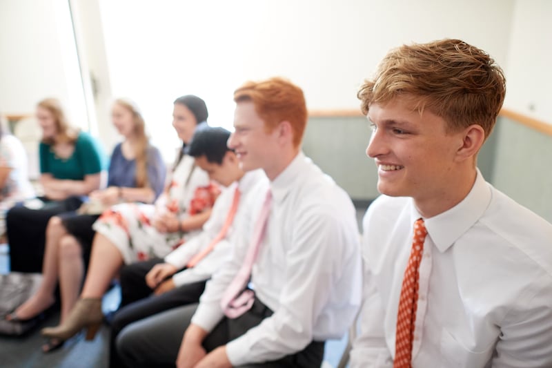 Latter-day Saint young men and young women attend a Sunday School class.