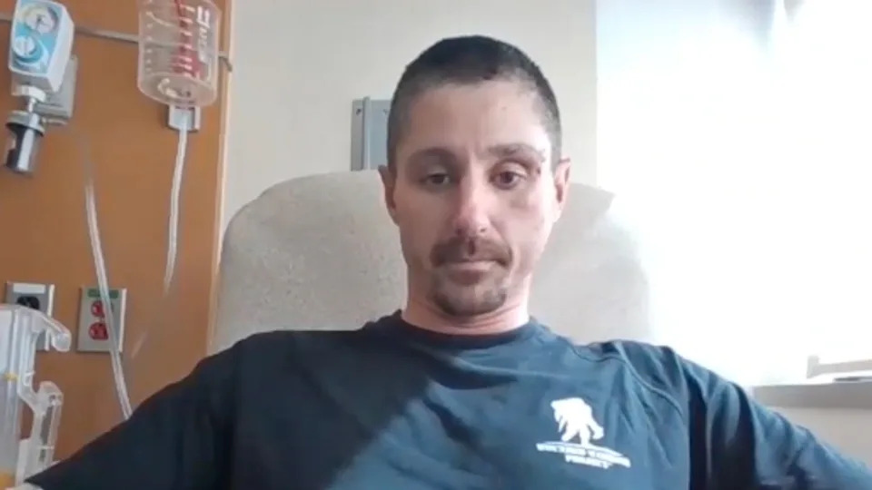 KSTP - PHOTO: Sgt. First Class Cory Hicks speaks with KSTP from his hospital room, March 9, 2026.