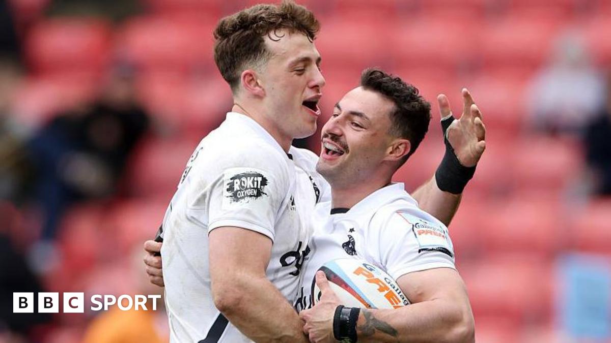 Bath's Bernard van der Linde hugs team-mate Louie Hennessey in celebration