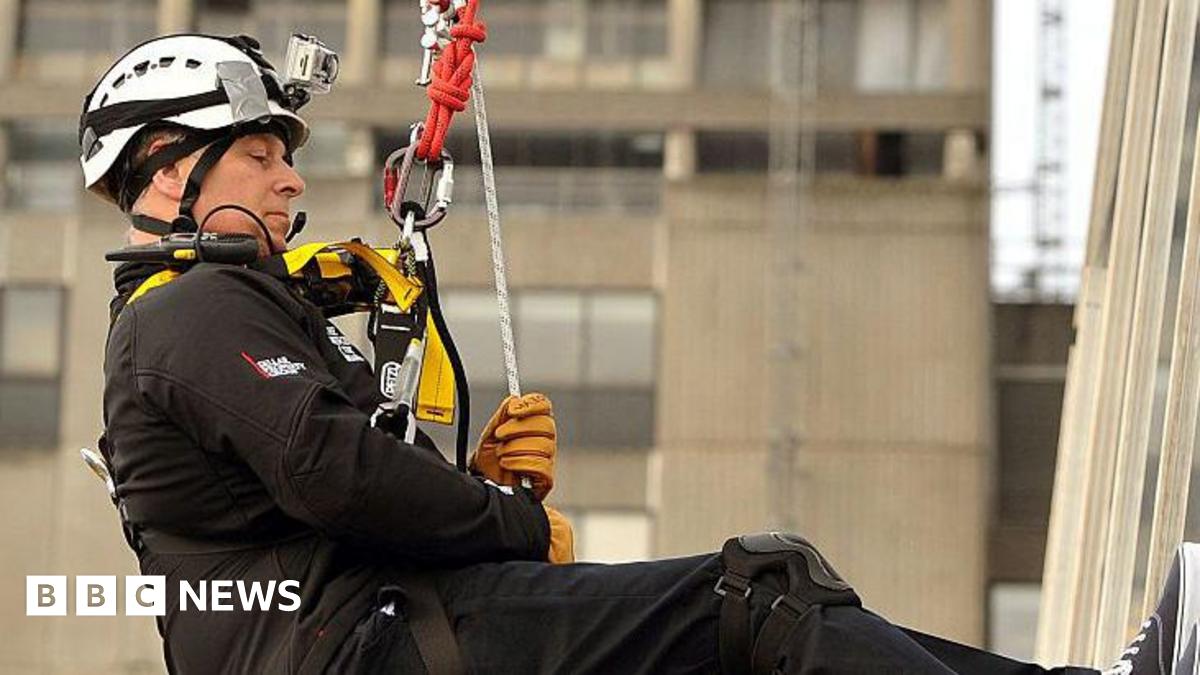 Then- Prince Andrew dangling on a rope wearing a hard hat