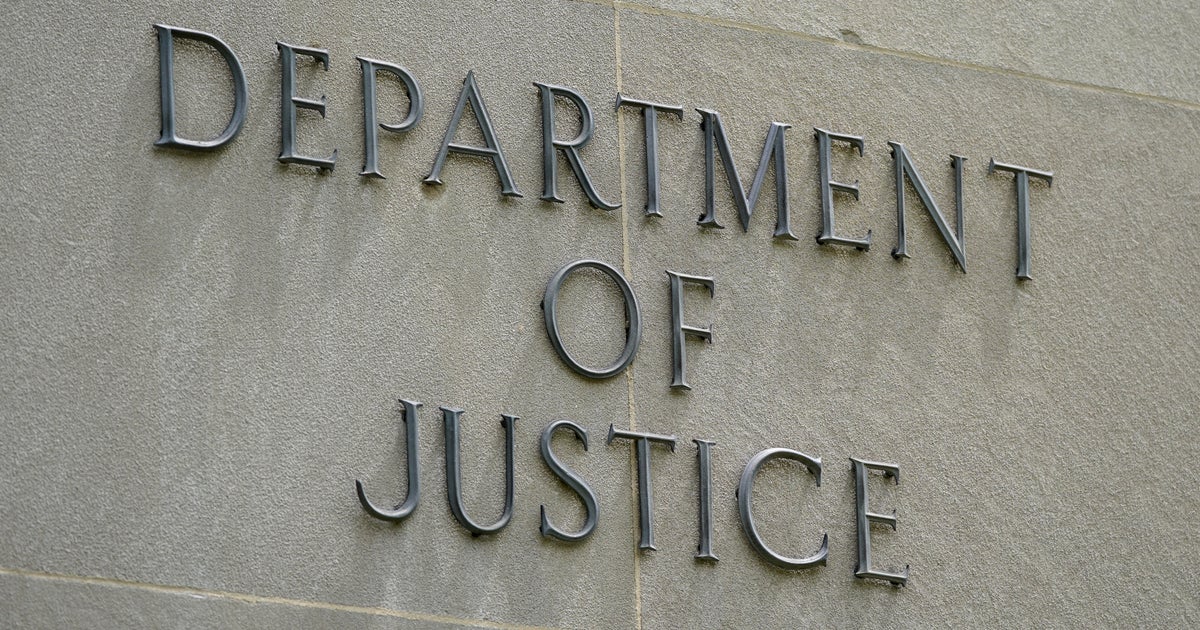 Justice Dept. employee charged in child pornography case