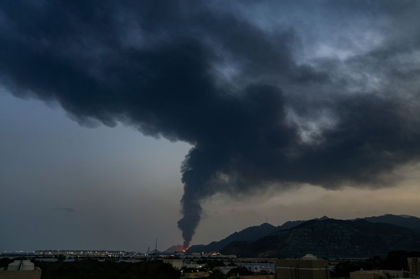 Fires and smoke billow up from a downed Iranian drone, debris from which hit an oil facility in Fujairah, United Arab Emirates, on March 3.