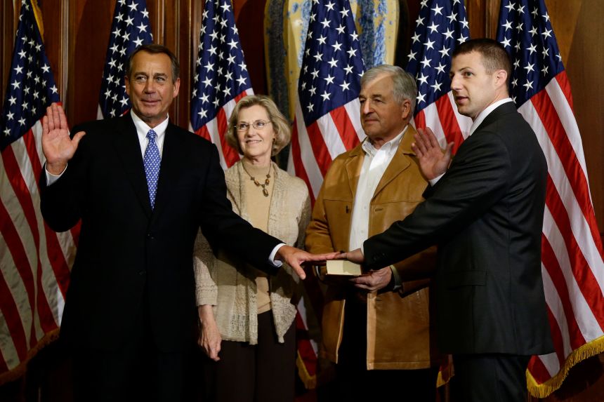 House Speaker John Boehner of Ohio performs a mock swearing in for Rep. Markwayne Mullin, on January 3, 2013.
