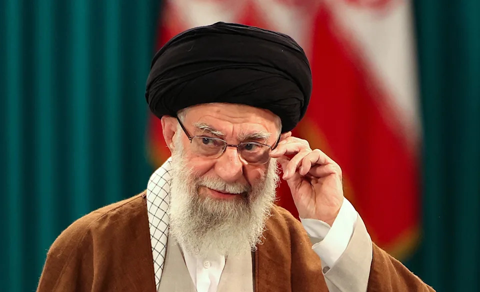 Atta Kenare/AFP via Getty Images - PHOTO: Iran's Supreme Leader Ayatollah Ali Khamenei adjusts his eyeglasses during a press conference after casting his ballot for the parliamentary runoff elections in Tehran, May 10, 2024.