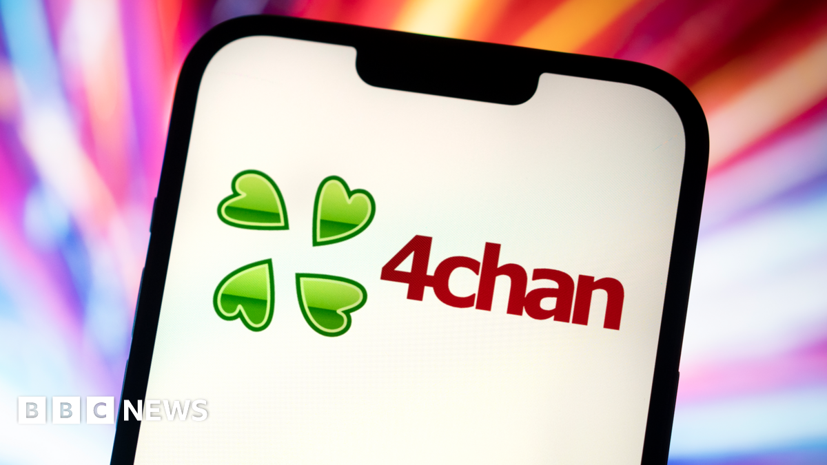 The 4chan logo displayed on a phone screen. It is four concentric green hearts, similar to a four-leaf clover.