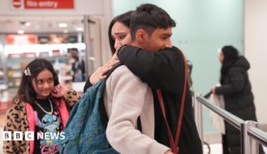 Ahmad, 12, is greeted by his mum, Hafsa, after arriving at Terminal 3 of London Heathrow Airport from Pakistan via Dubai, where he spent three nights alone in Dubai airport, looked after by Emirates staff.