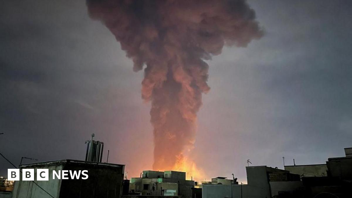 Smoke rises from a fire after a strike on Tehran