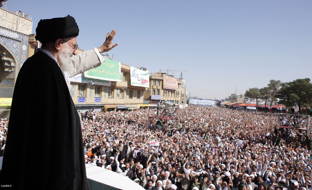 Khamenei waves to a crowd in the south of Tehran, on October 19, 2010.