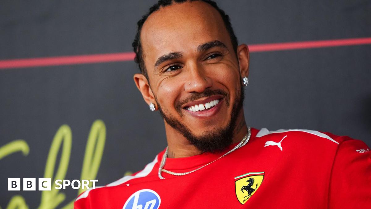 Lewis Hamilton during an FIA-F1 news conference during pre-season testing in Bahrain. He is wearing a Ferrari t-shirt