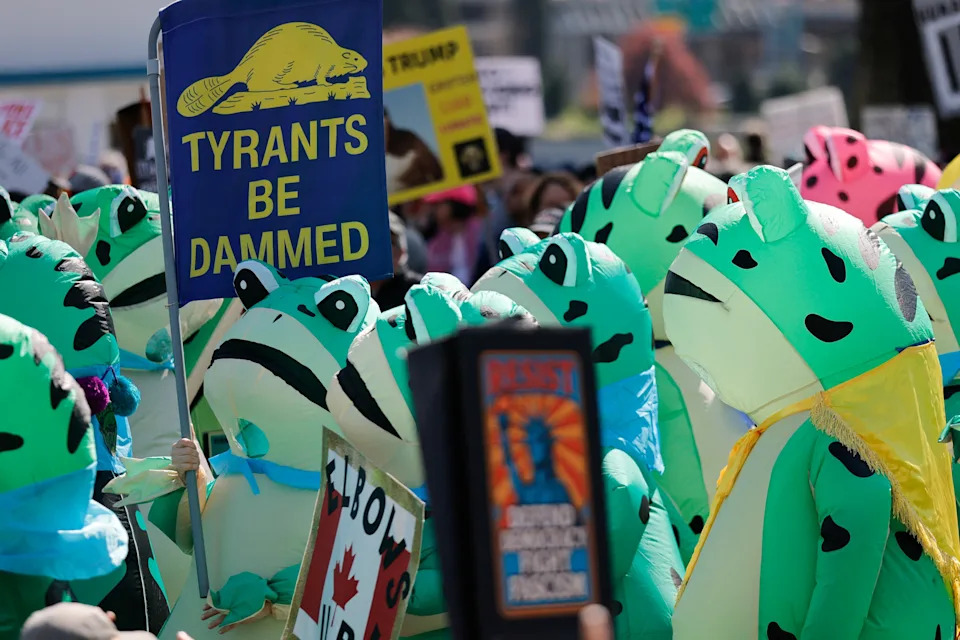 Demonstrators wearing inflatable costumes take part in a "No Kings" protest against U.S. President Donald Trump's administration policies, in Portland on March 28.