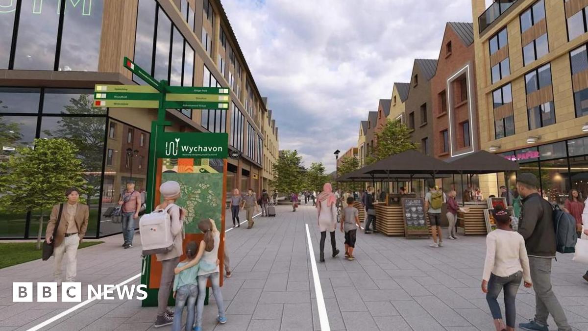 An artist's impression of a modern, pedestrian-only town centre with wide grey pavements and new buildings on both sides. People walk, shop and browse small market stalls under umbrellas.