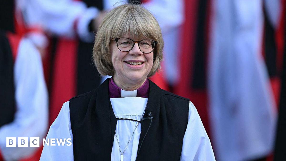 The new Archbishop of Canterbury Sarah Mullally smiles on the steps of St Paul's Cathedral after taking part in a 'Confirmation of Election' ceremony in London