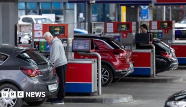 People at a petrol station in Slovenia