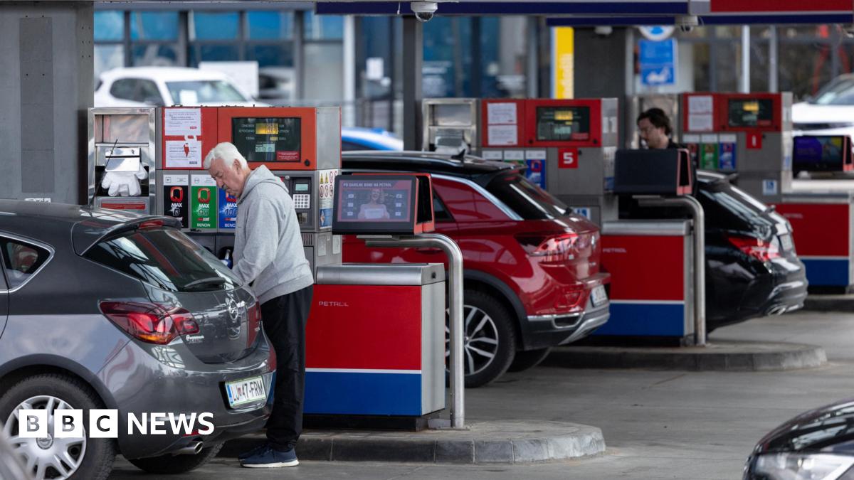 People at a petrol station in Slovenia