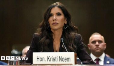 Screengrab from video showing several officers restraining Alex. Has a Verify branded blue border.