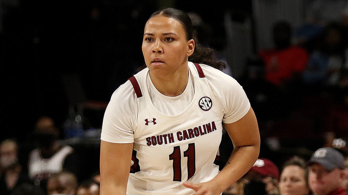 Destiny Littleton dribbles