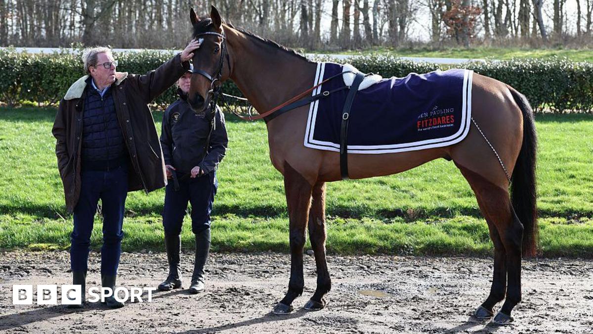 Harry Redknapp touching the head of Jukebox Man