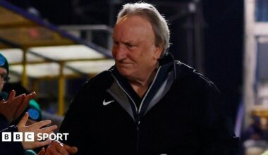 Neil Warnock greets the Torquay fans at Plainmoor