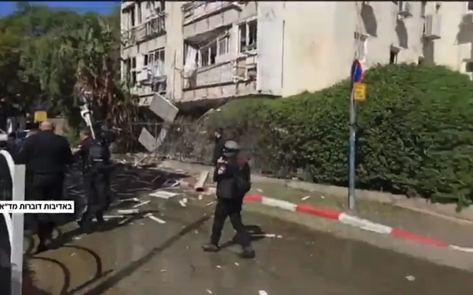The aftermath of cluster bomb that fell on Tel Aviv