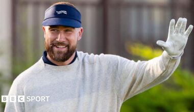 Travis Kelce waves before the start of the second round of the AT&T Pebble Beach Pro-Am in 2026