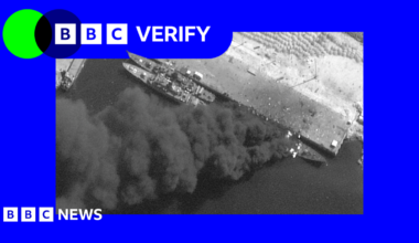 Three ships are seen docked at an Iranian port in a satellite image. Smoke can be seen billowing from one of the ships. The image is imposed over the BBC Verify colours and branding.