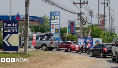 Long queues of vehicles line the road in Mae Sot, west Thailand waiting for fuel amid ongoing supply concerns. Residents in Mae Sot are rushing to buy fuel due to worries about potential shortages and price increases from the conflict in the Middle East.