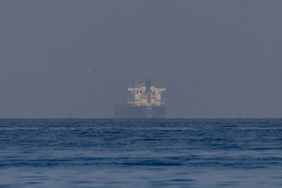 Getty Images - PHOTO: A tanker is pictured in the Persian Gulf, near the Strait of Hormuz, on March 22, 2026 from Ras al Khaimah, United Arab Emirates.
