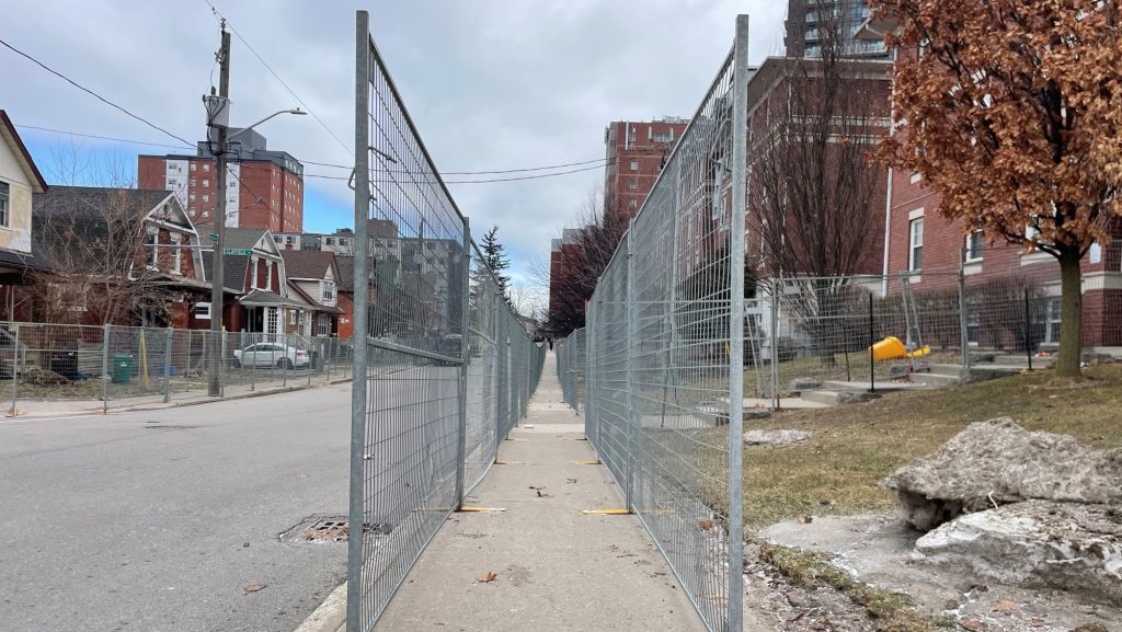 Fences are being set up on Ezra Avenue in Waterloo ahead of St. Patrick's Day. (Mark Douglas/ CityNews)