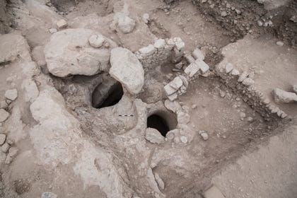 The two opening shafts and the staircase leading to the cistern