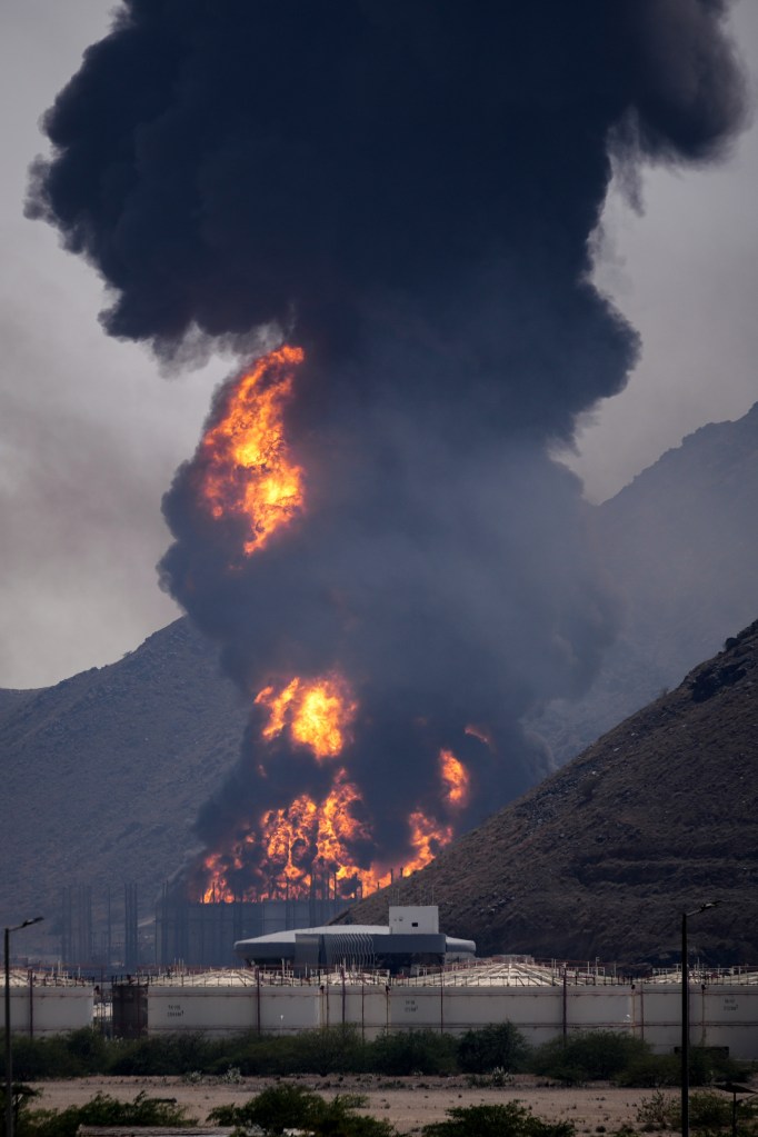 Fire and smoke rising from an oil facility struck by an Iranian drone in Fujairah, United Arab Emirates.