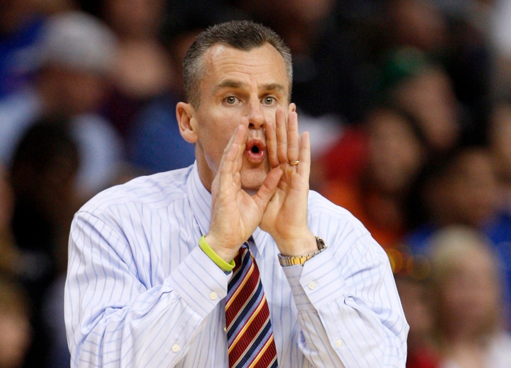 Florida Gators head coach Billy Donovan shouting instructions during a basketball game.