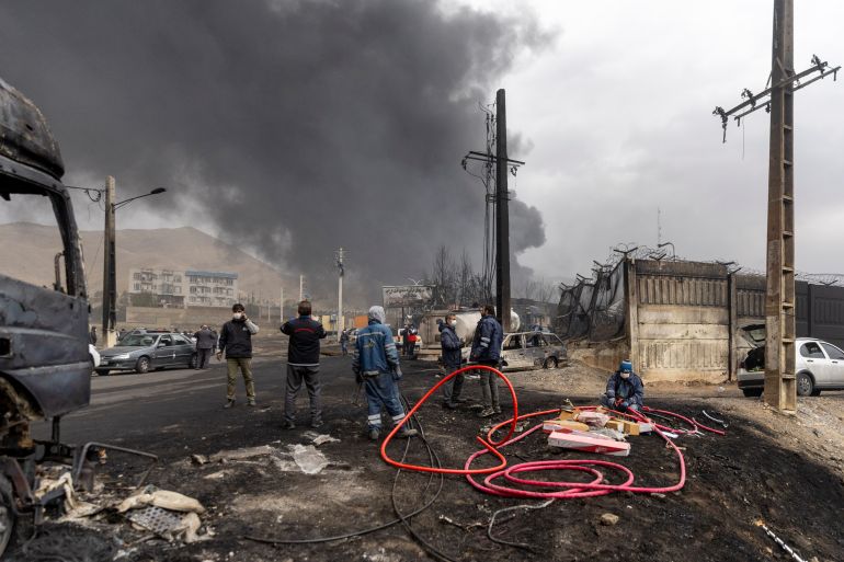 TEHRAN, IRAN - MARCH 8: Smoke billows after overnight airstrikes on oil depots on March 8, 2026 in Tehran, Iran. The United States and Israel continued their joint attack on Iran that began on February 28. Iran retaliated by firing waves of missiles and drones at Israel, and targeting U.S. allies in the region. (Photo by Majid Saeedi/Getty Images)
