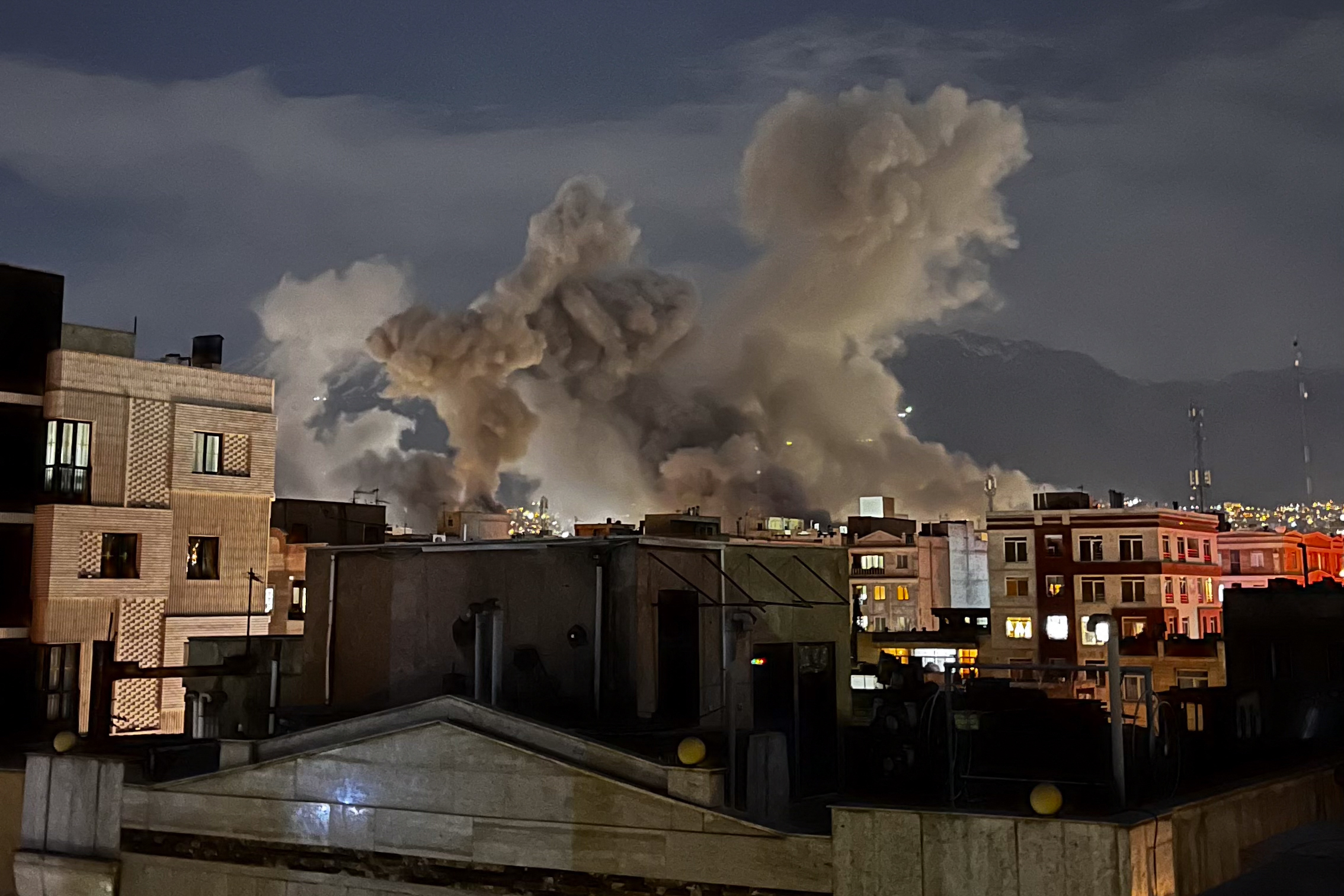Plumes of smoke rise following reported explosions allegedly near Iran’s Ministry of Intelligence on Araqi Street in Tehran on March 1, 2026.