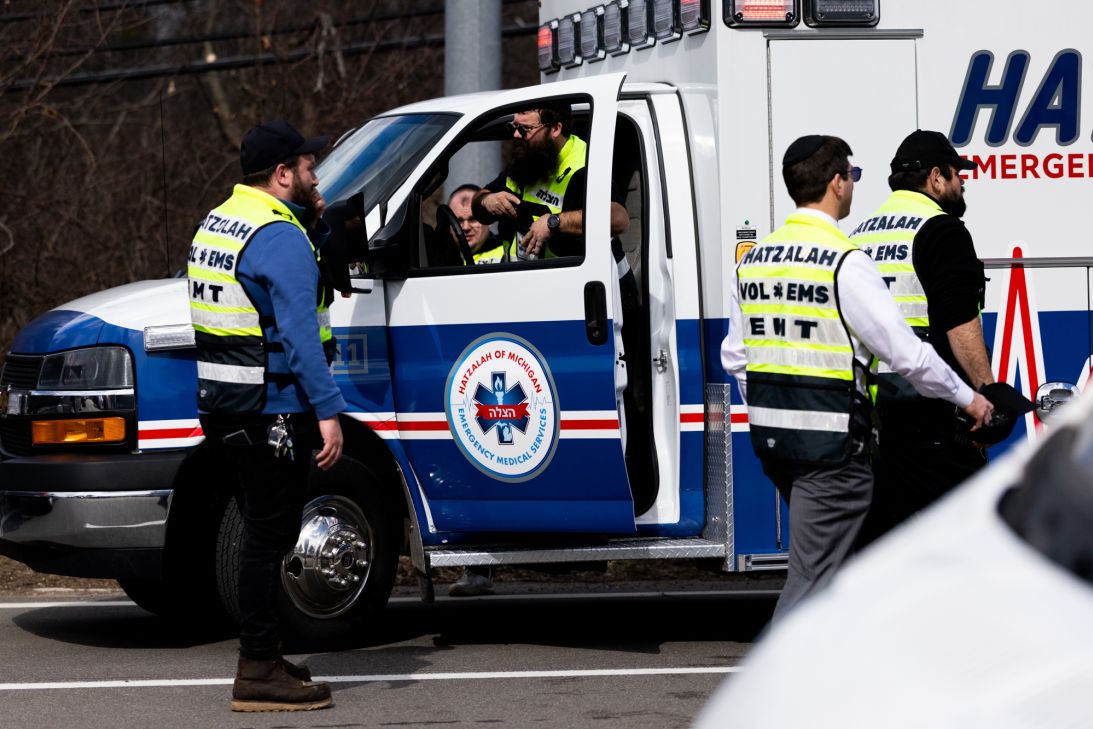 Members of Hatzalah of Michigan, a Jewish volunteer emergency medical service, survey the area near Temple Israel on March 12, 2026.