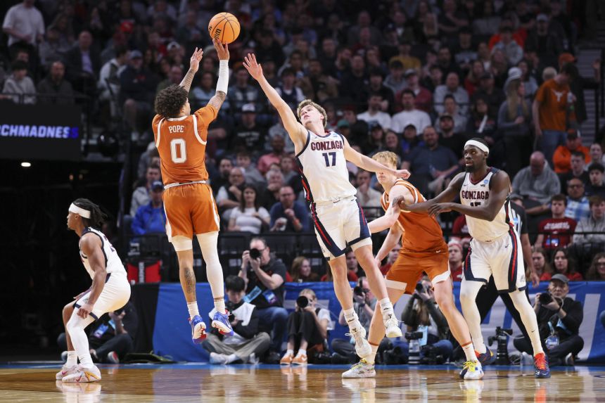 Jordan Pope of the Texas Longhorns shoots the ball against the Gonzaga Bulldogs last weekend.