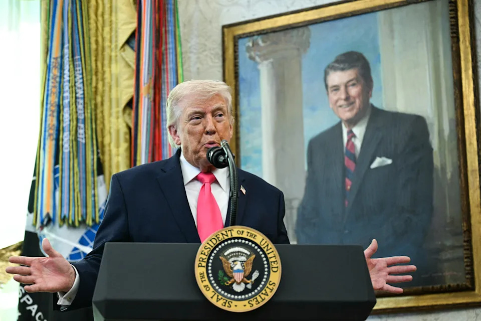 President Trump speaks in the Oval Office.