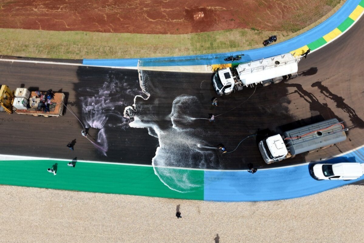 Teams are at the track attempting to clear away the water